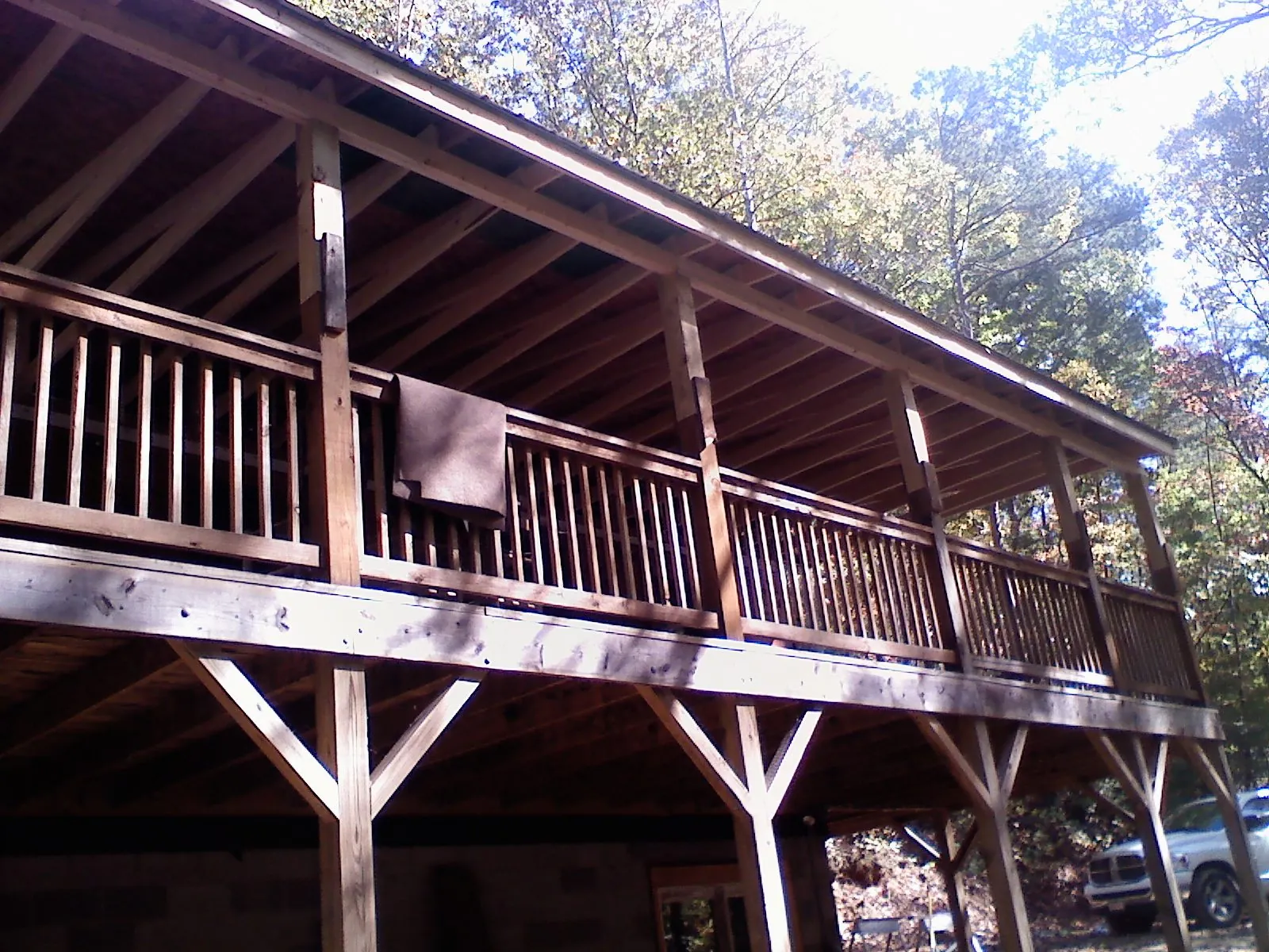 Timber framing under a new elevated porch and deck — Roof Leak Repair in Rushville by Roofing Brothers